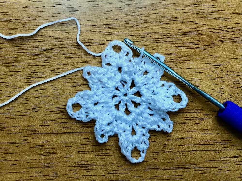 white christmas star ornament showing completed round 3