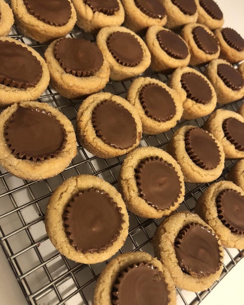 peanut butter cookies with a mini peanut butter cup in the center