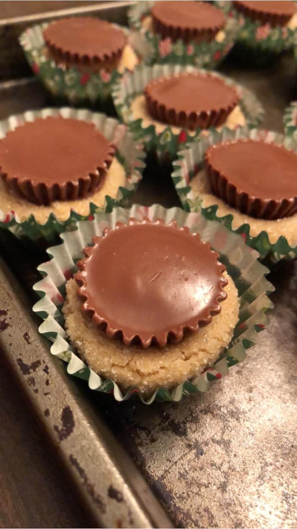 peanut butter cookies with a mini peanut butter cup in the center