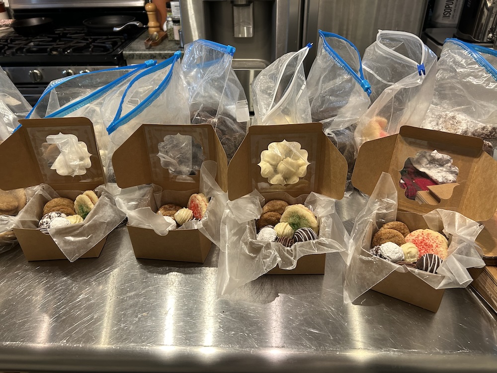 tins and boxes containing a variety of baked goods.