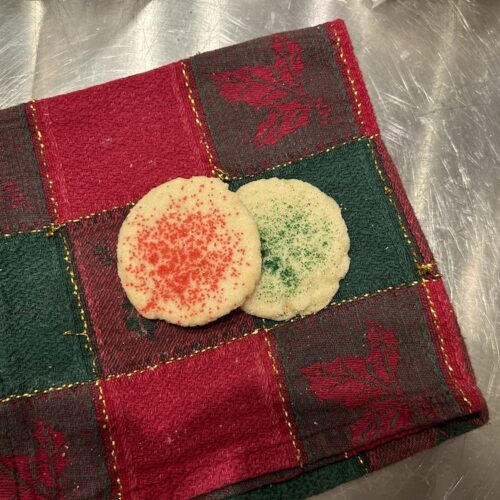 round sugar cookies with red and green sprinkles