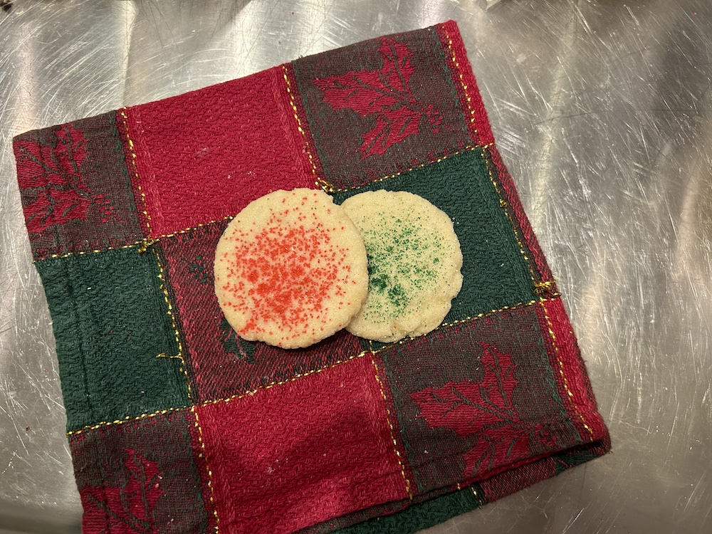 round sugar cookies with red and green sprinkles